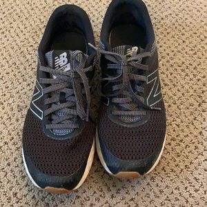 Women’s black New Balance sneaker